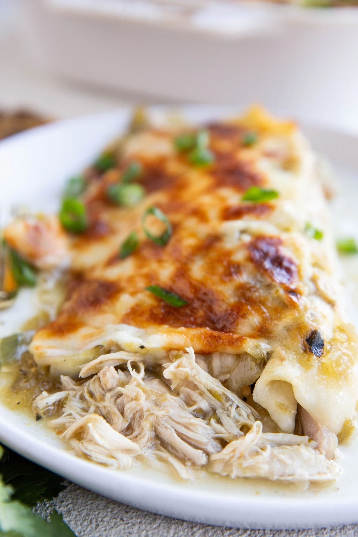 Chili Verde Shredded Chicken Enchiladas with homemade green salsa | theroastedroot.net #mexican #recipe