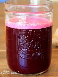 beet juice made using a blender instead of a juicer. Includes apple, orange, ginger, kale and coconut water