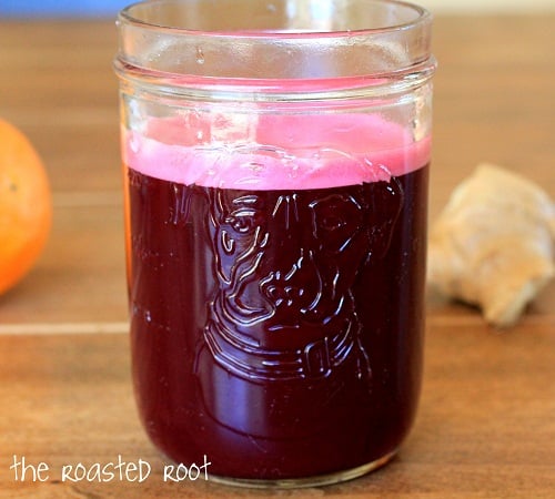 beet juice made using a blender instead of a juicer. Includes apple, orange, ginger, kale and coconut water