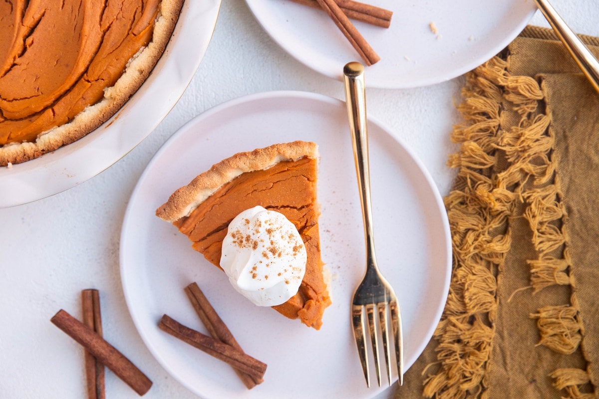 Two plates of slices of sweet potato pie