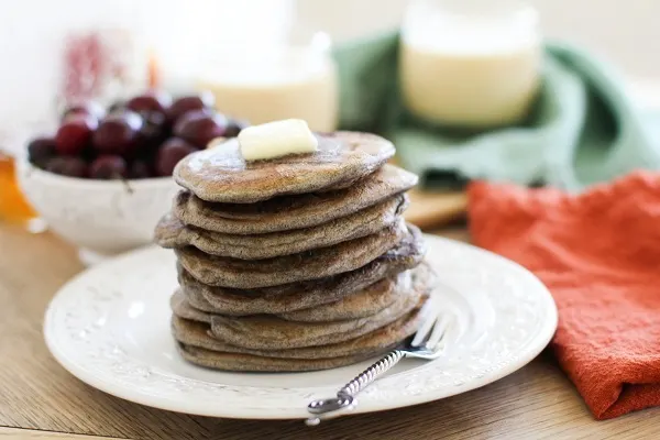 Buckwheat Sourdough Pancakes with cherries | https://www.theroastedroot.net