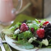 Raspberry Pistachio Salad with Creamy Raspberry Vinaigrette | https://www.theroastedroot.net