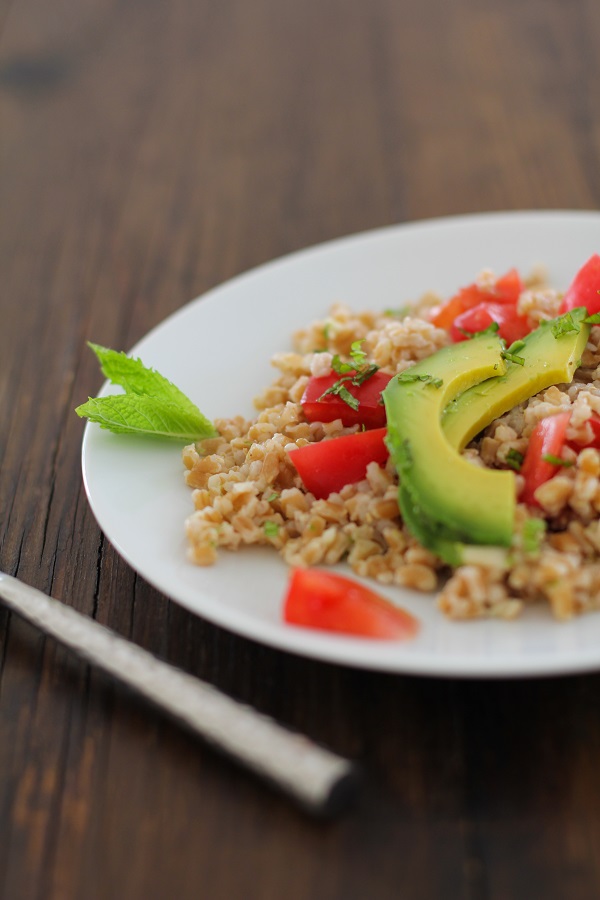 Heirloom Tomato and Avocado Farro Salad with Mint-Lime Dressing | https://www.theroastedroot.net