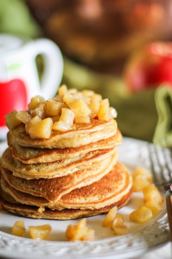 Grain-Free Apple Cinnamon Pancakes made with coconut flour. Dairy-free, gluten-free, amazing fluffy pancakes!