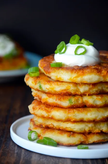 Cheesy Leftover Mashed Potato Pancakes from Just a Taste + 50 Thanksgiving Leftover Recipes
