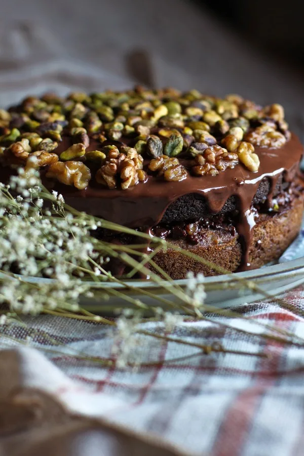 Chocolate and Banana Layer Cake, topped with walnuts and pistachios from Green Spirit Adventures