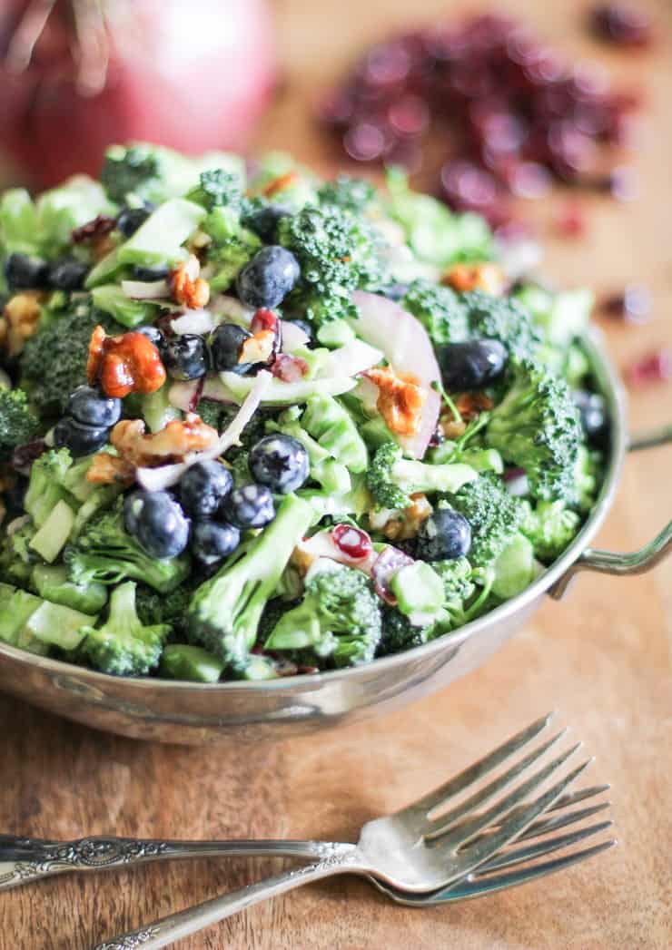 Healthier Broccoli Salad with Yogurt Dressing, blueberries, cranberries, bacon, and honey-toasted walnuts