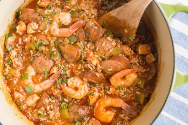 Horizontal image of Dutch oven filled with finished Jambalaya