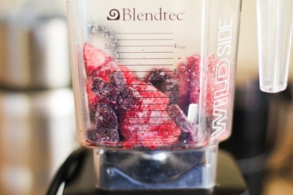 Ingredients for an anti-inflammatory beet smoothie in a blendtec blender, ready to blend.