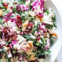 Raw Cauliflower Couscous - packed with cabbage, kale, walnuts, dried cranberries with a zesty dressing. Vegan, paleo, gluten-free, healthy!