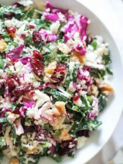 Raw Cauliflower Couscous - packed with cabbage, kale, walnuts, dried cranberries with a zesty dressing. Vegan, paleo, gluten-free, healthy!
