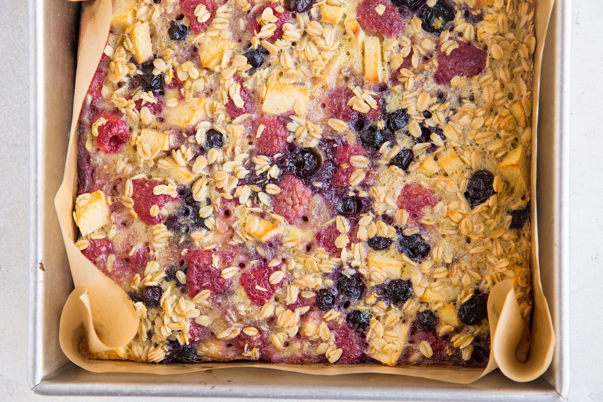 Mixed Berry and Apple Baked Oatmeal in a baking pan fresh out of the oven