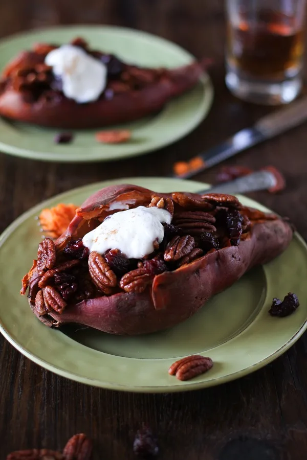 Stuffed Sweet Potatoes with Bourbon Maple Candied Pecans and Cranberries | a simple and delicious holiday side dish! #Thanksgiving