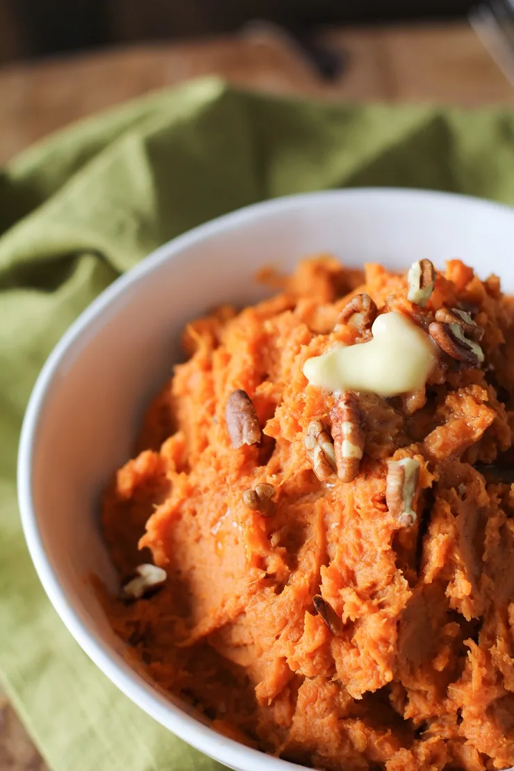 Maple Bourbon Mashed Sweet Potatoes are a magically flavorful side dish that is easy to prepare and perfect for serving guests!