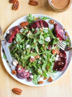 Roasted Beet Salad with Goat Cheese, Arugula, Pecans, dried cranberries and balsamic vinaigrette