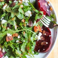 Roasted Beet Arugula Salad with Goat Cheese, pecans, dried cranberries and maple balsamic vinaigrette