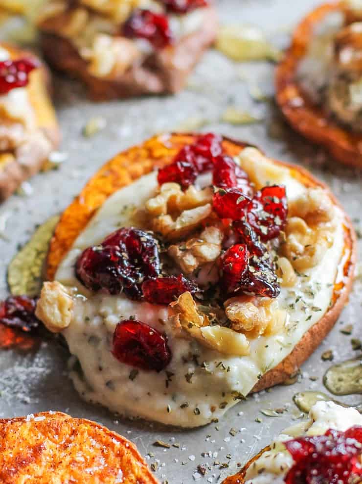 Roasted Sweet Potato Rounds with Herbed Ricotta, Dried Cranberries, Walnuts, and Honey - an easy, healthy festive appetizer!