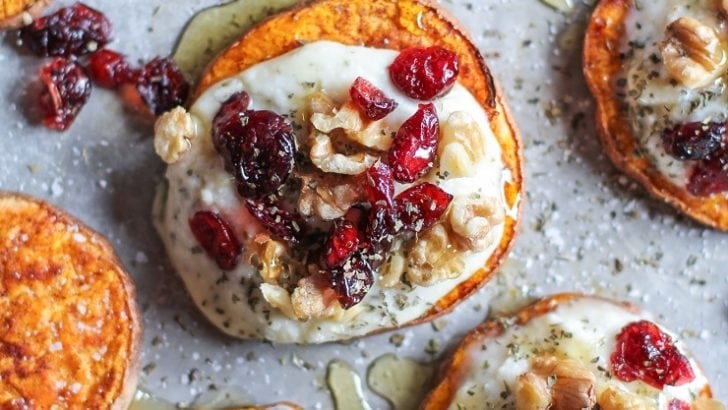 Sweet Potato Rounds with Herbed Ricotta Roasted Walnuts, Cranberries, and Honey | TheRoastedRoot.net an easy and healthy appetizer! #recipe #glutenfree #healthy #holiday