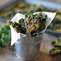 Nacho Cheese Kale Chips - Super crispy and addicting! Made with tahini and nutritional yeast #vegan #healthy #snack #recipe @bobsredmill