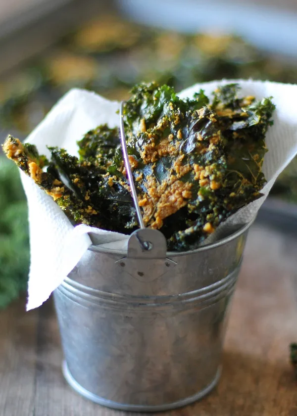 Nacho Cheese Kale Chips - Super crispy and addicting! Made with tahini and nutritional yeast #vegan #healthy #snack #recipe @bobsredmill