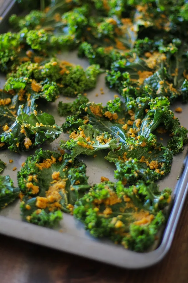 Nacho Cheese Kale Chips - Super crispy and addicting! Made with tahini and nutritional yeast #vegan #healthy #snack #recipe @bobsredmill
