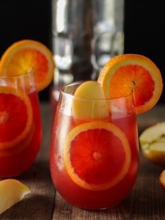 Winter Sangria with Pomegranate, Blood Oranges, and Apples | theroastedroot.net #cocktail #wine #recipe @roastedroot