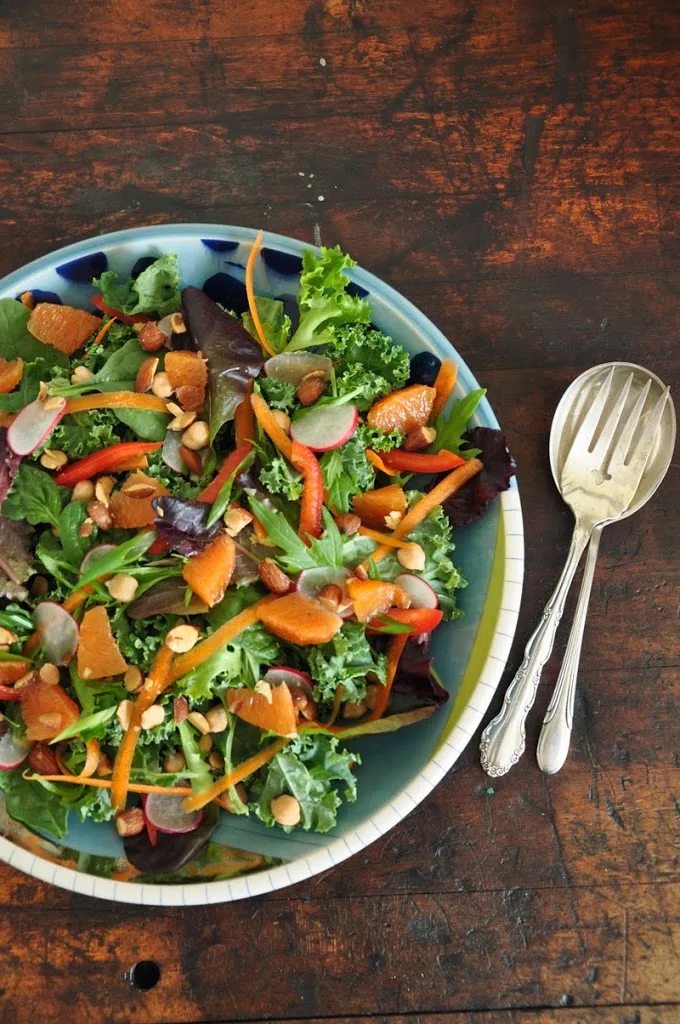 Kara Kara, Orange, and Smoked Almond Kale Salad from Hola Jalapeno