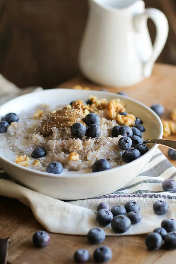 Superfood Blueberry Buckwheat Porridge with walnuts, chia seeds, almond butter, and coconut milk | theroastedroot.net #paleo #glutenfree #sugarfree #breakfast #recipe @bobsredmill @roastedroot