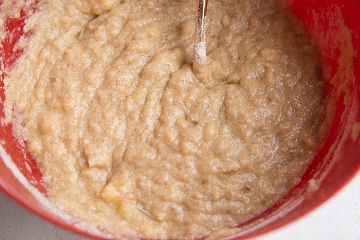 Coconut flour banana bread batter in a mixing bowl