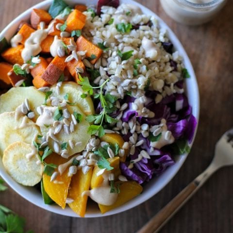 Roasted Root Vegetable Buddha Bowls with Maple Cinnamon Tahini Dressing | theroastedroot.net #vegan #recipe #eattherainbow