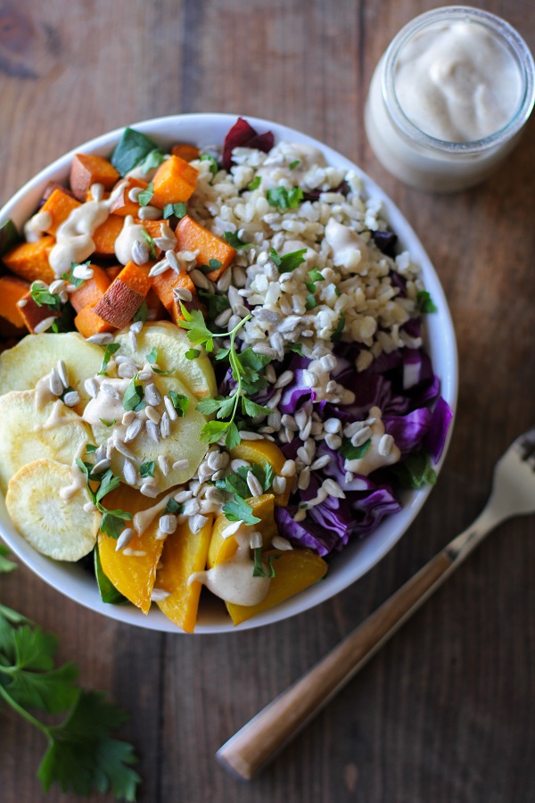 Roasted Root Vegetable Buddha Bowls with Maple Cinnamon Tahini Dressing | theroastedroot.net #vegan #recipe #eattherainbow