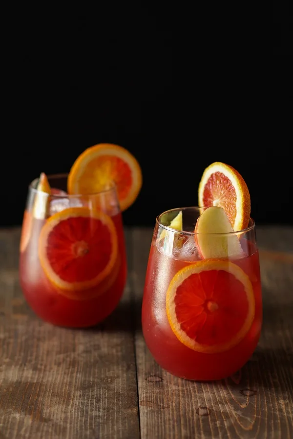Winter Sangria with Pomegranate, Blood Oranges, and Apples | theroastedroot.net #cocktail #wine #recipe @roastedroot
