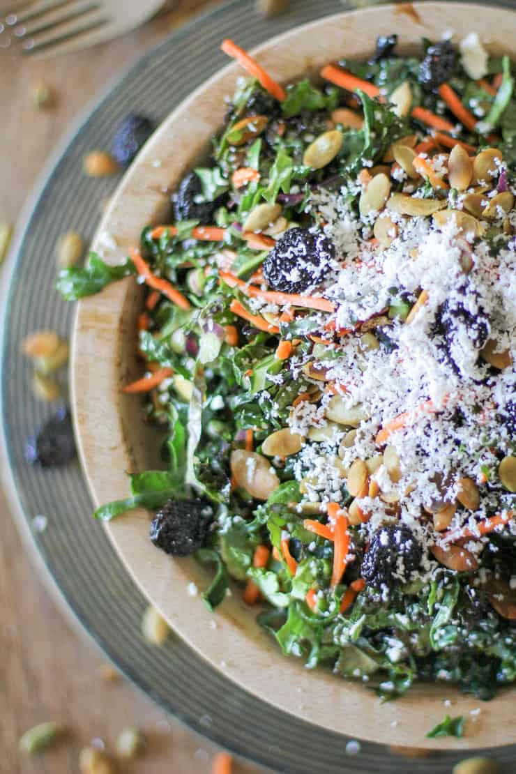 Kale Salad with Dried Cranberries, Pumpkin Seeds, and Lemon Parsley Dressing