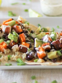 Sweet Potato, Black Bean, and Quinoa Tacos with Avocado and Lemon Tahini Sauce #vegetarian #vegan #meatlessmonday