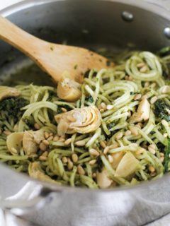 Turnip Pesto Pasta with Artichoke Hearts, Kale, and Pine Nuts - spiralize turnips for a comforting yet healthy meal! | theroastedroot.net #paleo #vegan #vegetarian #healthy #dinner #recipe @roastedroot