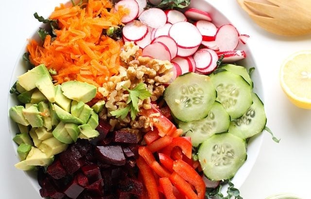 Spring Cleaning Detox Salad with kale, bell pepper, radishes, carrots, beets, avocado, walnuts, and lemon-parsley vinaigrette | theroastedroot.net #vegan #vegetarian #detox #salad #cleaneating #letthemeatkale