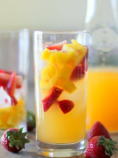 Strawberry Orange Mango Kombucha Mocktails | A probiotic-rich healthy fizzy fruity beverage | theroastedroot.net #kombucha #probiotics #cocktail #mocktail #recipe #summer