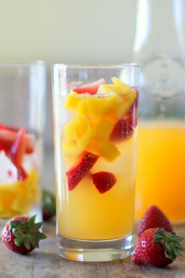 Strawberry Orange Mango Kombucha Mocktails | A probiotic-rich healthy fizzy fruity beverage | theroastedroot.net #kombucha #probiotics #cocktail #mocktail #recipe #summer