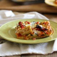 Prosciutto, Artichoke Heart, and Sun-Dried Tomato Pizza with Pine Nuts and Spinach | theroastedroot.net #glutenfree #pizza @bobsredmill @roastedroot