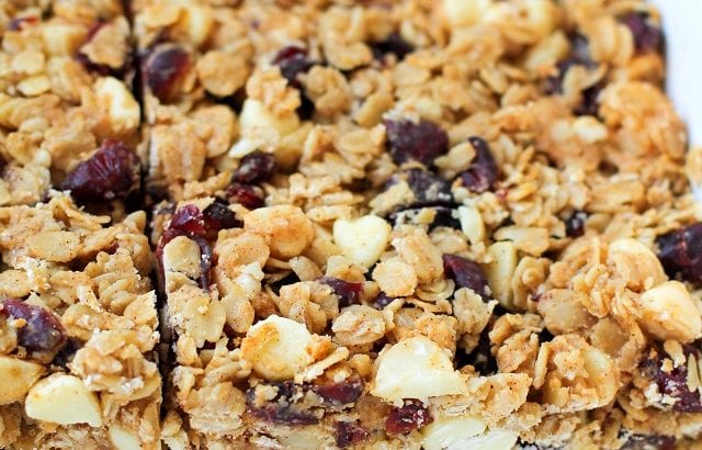 Cranberry White Chocolate Macadamia Nut Granola Bars | theroastedroot.net Healthy granola bars made with rolled oats and honey @bobsredmill @roastedroot