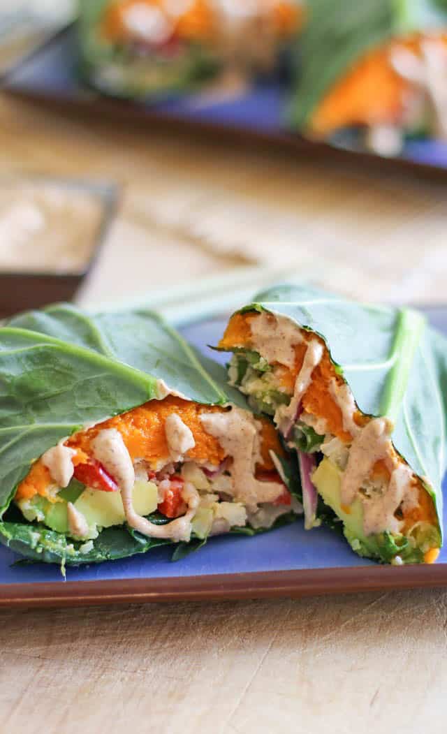 Roasted Sweet Potato and Cauliflower Rice Collard Wraps with avocado and almond ginger sauce - these healthy vegan wraps are perfect for lunch!