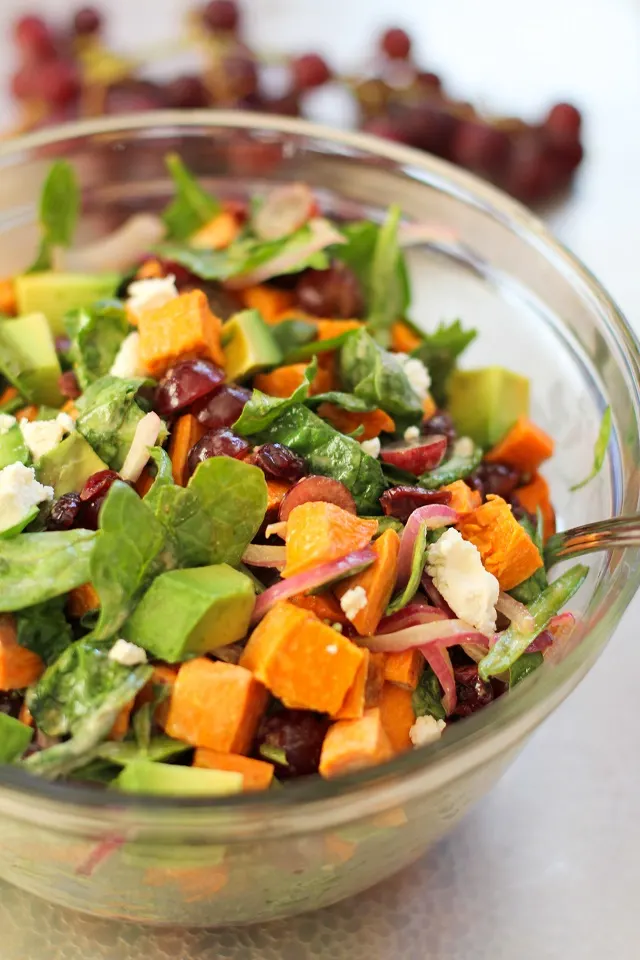 Roasted Sweet Potato Salad with Spinach, Grapes, Dried Cranberries, and Avocado | theroastedroot.net #vegan #vegetarian #healthy #recipe