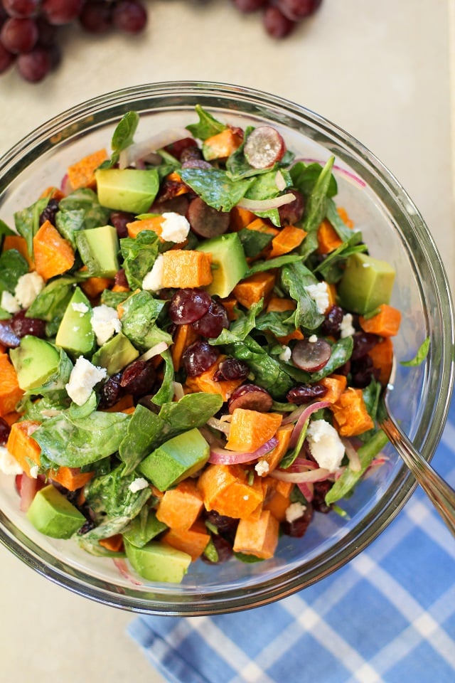 Roasted Sweet Potato Salad with Spinach, Grapes, Dried Cranberries, and Avocado | theroastedroot.net