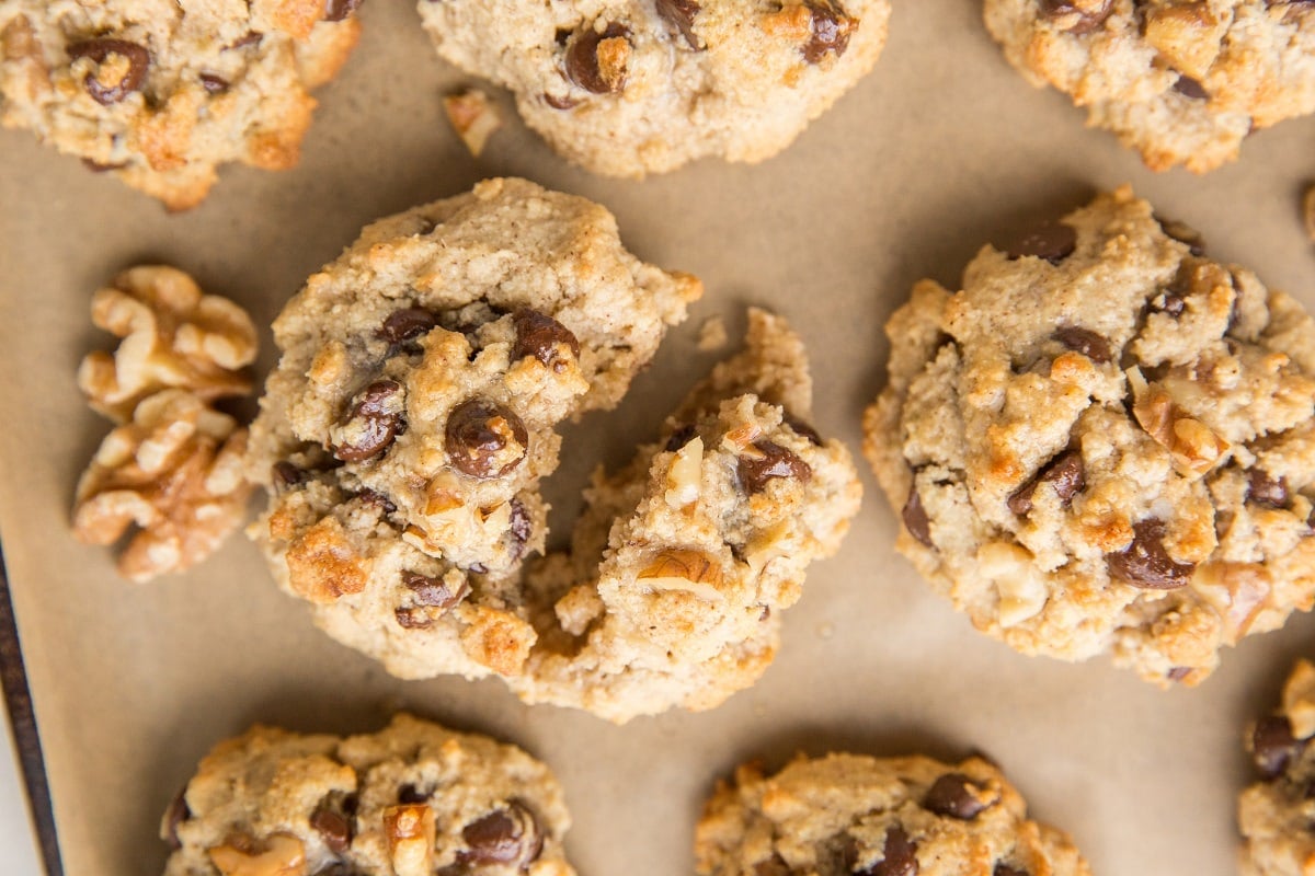 Horizontal photo of the BEST Almond Flour Chocolate Chip Cookies on a cookie sheet