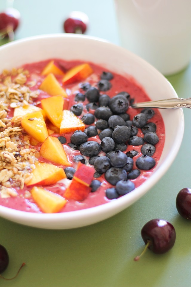 Cherry Coconut Smoothie Bowls with peaches, blueberries, and granola - a healthy vegan and paleo-friendly breakfast | theroastedroot.net #brunch #healthy #recipe
