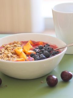 Cherry Coconut Smoothie Bowls with peaches, blueberries, and granola - a healthy vegan and paleo-friendly breakfast | theroastedroot.net #brunch #healthy #recipe