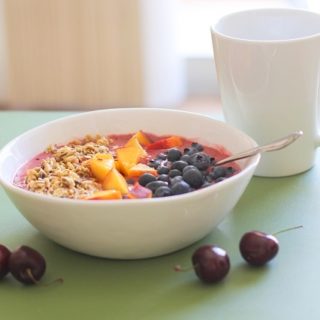 Cherry Coconut Smoothie Bowls with peaches, blueberries, and granola - a healthy vegan and paleo-friendly breakfast | theroastedroot.net #brunch #healthy #recipe