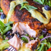 Crispy Jamaican Jerk Salmon Salad with Mango Vinaigrette. A vibrant, healthy dinner recipe!