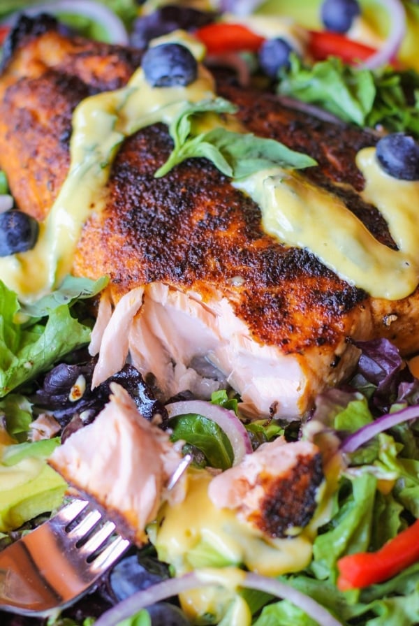 Crispy Jamaican Jerk Salmon Salad with Mango Vinaigrette. A vibrant, healthy dinner recipe!