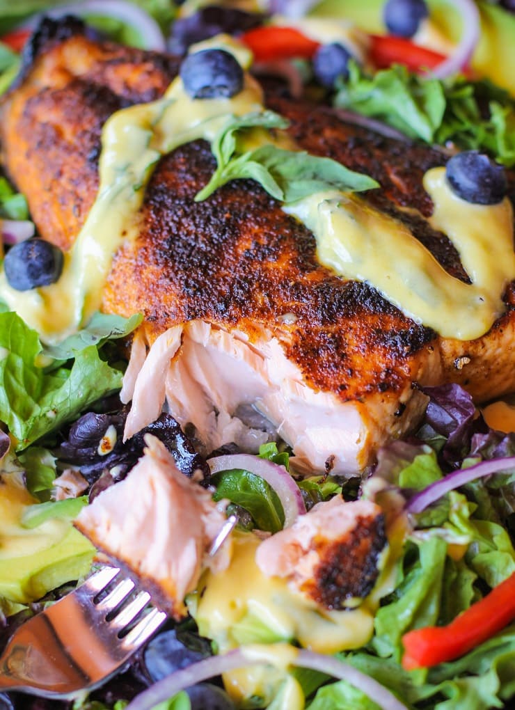 Crispy Jamaican Jerk Salmon Salad with Mango Vinaigrette. A vibrant, healthy dinner recipe!